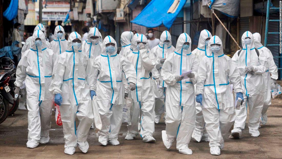 Health-care workers prepare to conduct Covid-19 testing in Mumbai, India, on June 23.